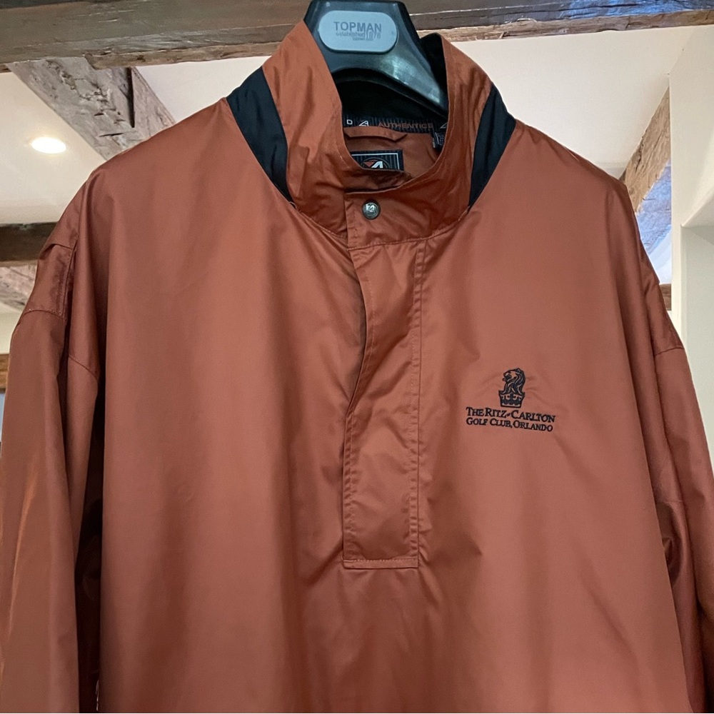 Ritz Carlton Golf Club Orlando copper, quarter sleeve, rain pullover. Size XL.